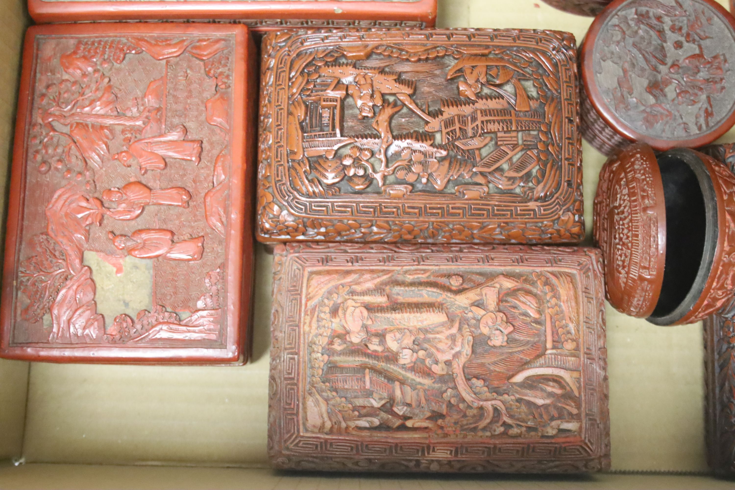 An assortment of Chinese cinnabar lacquer and other later boxes, largest 29 x 10cm